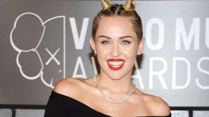 Miley-Cyrus-Performs-In-Union-Jack-Leotard-Dress-Opening-Bangerz-Tour-2